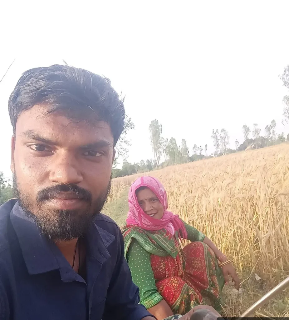 My journey: From Farming Fields to Digital Fields in 2025 16 A young agricultural graduate with a woman farmer in a ripened wheat field, representing real-world farming challenges and hands-on rural learning.